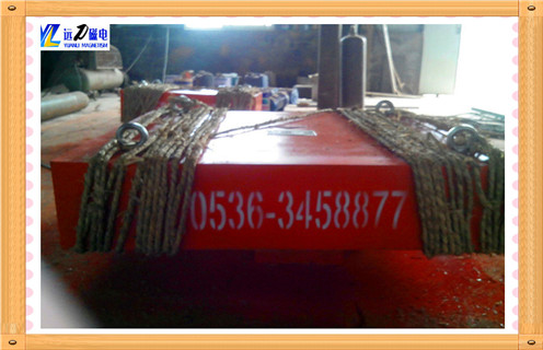 除鐵器，懸掛式除鐵器，懸掛式除鐵器物料中的鐵磁雜物吸附